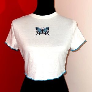 SHEIN cropped top with blue butterfly design.